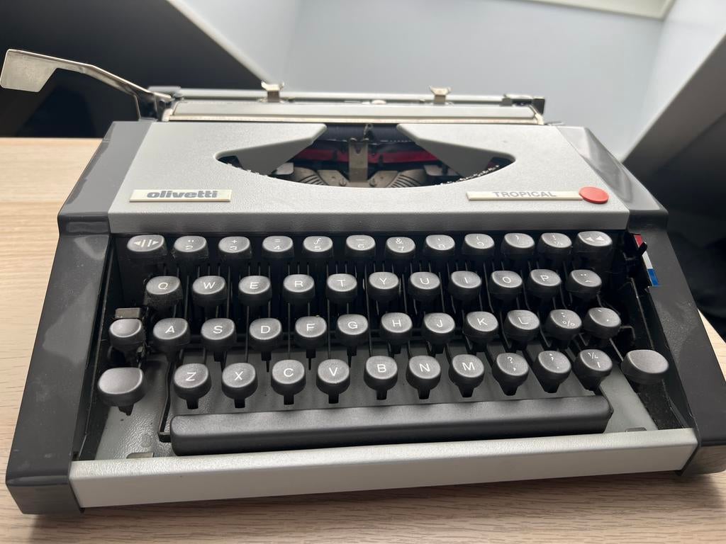 Grijze Olivetti Tropical typemachine, Diversen, Typemachines, Verzenden, Zo goed als nieuw