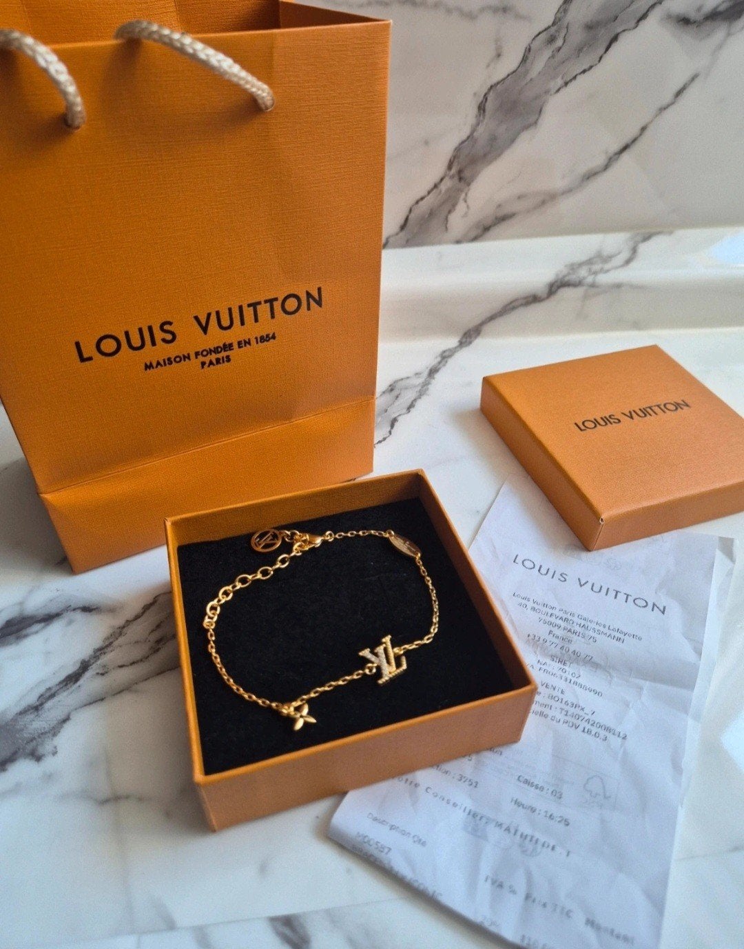 Louis Vuitton armband, Ophalen of Verzenden, Zo goed als nieuw, Leer