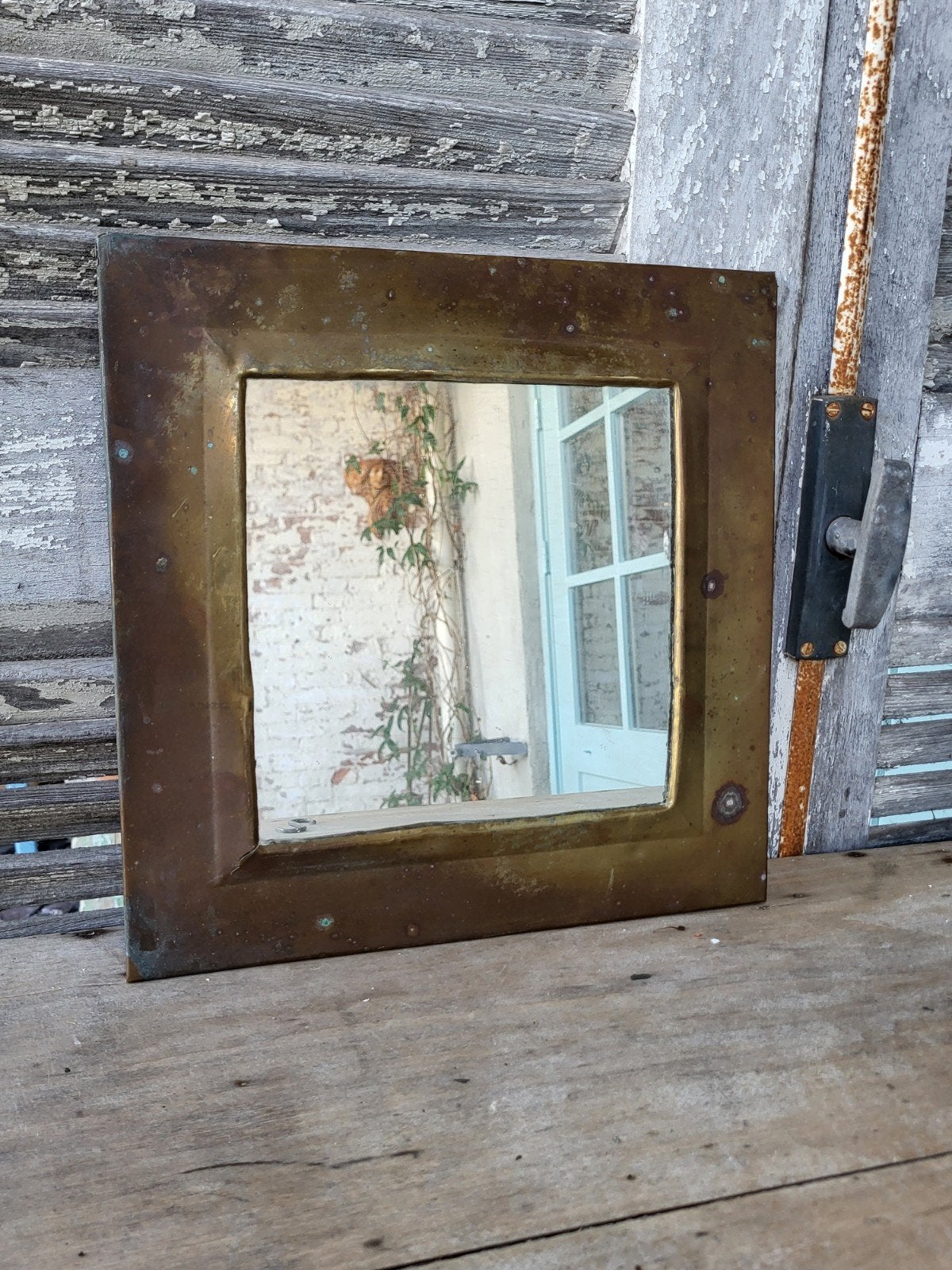 brocante/ vintage koperkleurige spiegel  / allegonda, Antiek en Kunst, Antiek | Spiegels, Ophalen of Verzenden, Ovaal, Minder dan 50 cm