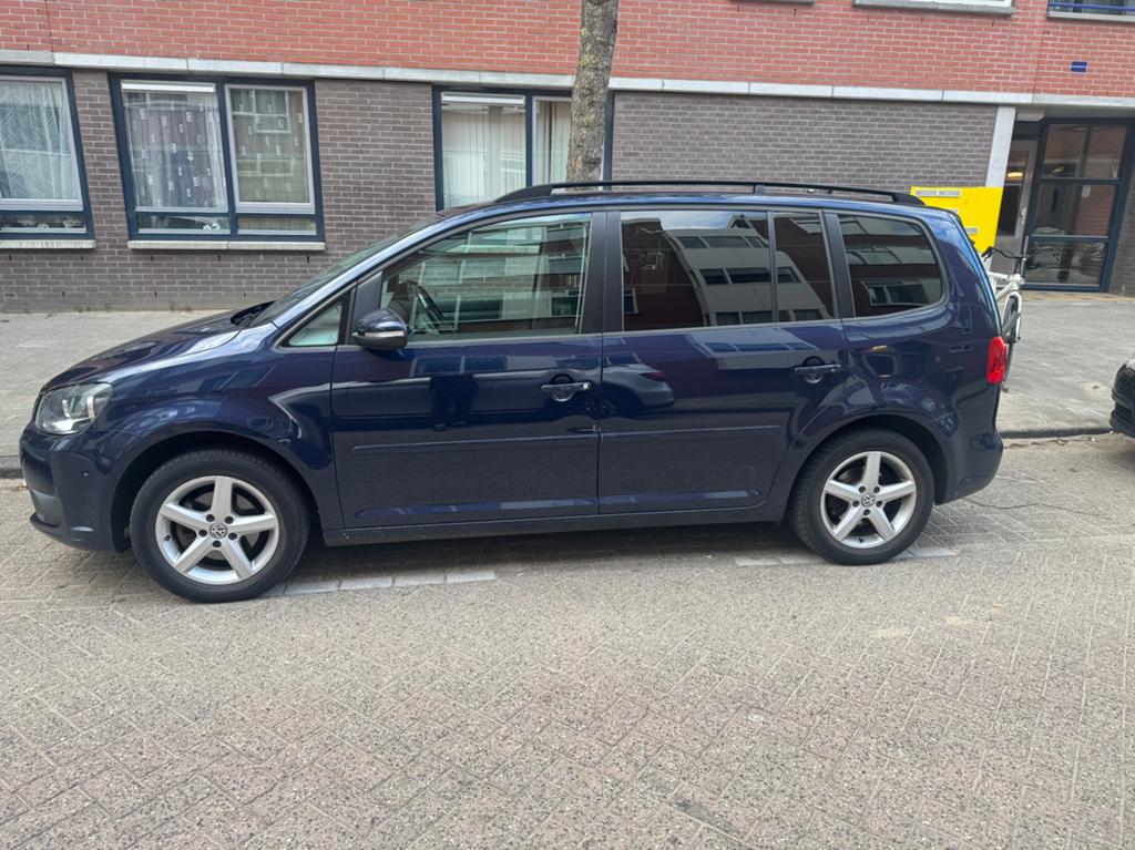 Volkswagen Touran 1.2 TSI 77KW BMT 7P 2011 Blauw, Auto's, Voorwielaandrijving, 4 cilinders, Blauw, 1353 kg