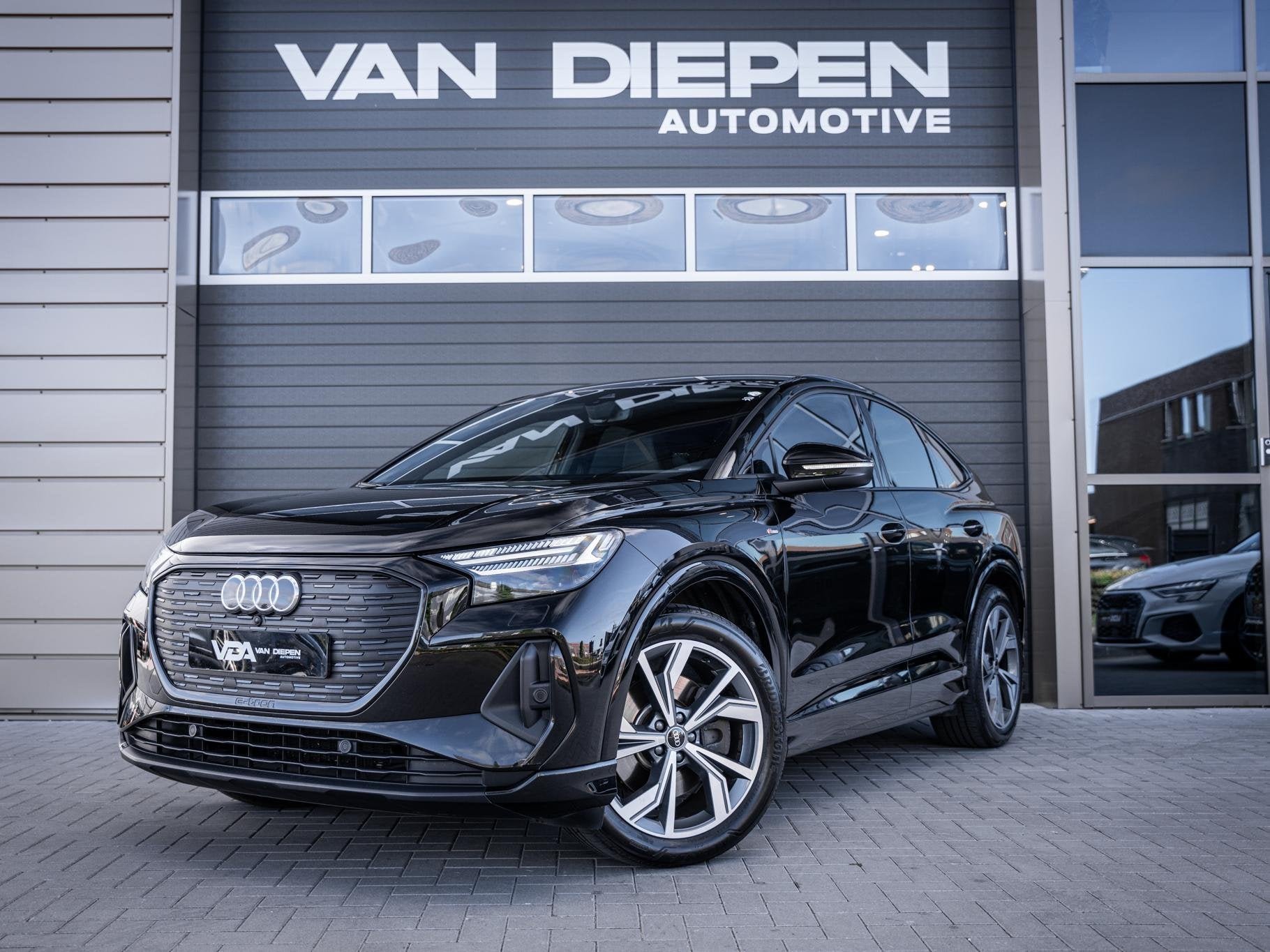 Audi Q4 Sportback e-tron 40 S edition 77 kWh 2x-Sline l Warm, Auto's, Audi, Automaat, Achterwielaandrijving, Zwart, Zwart