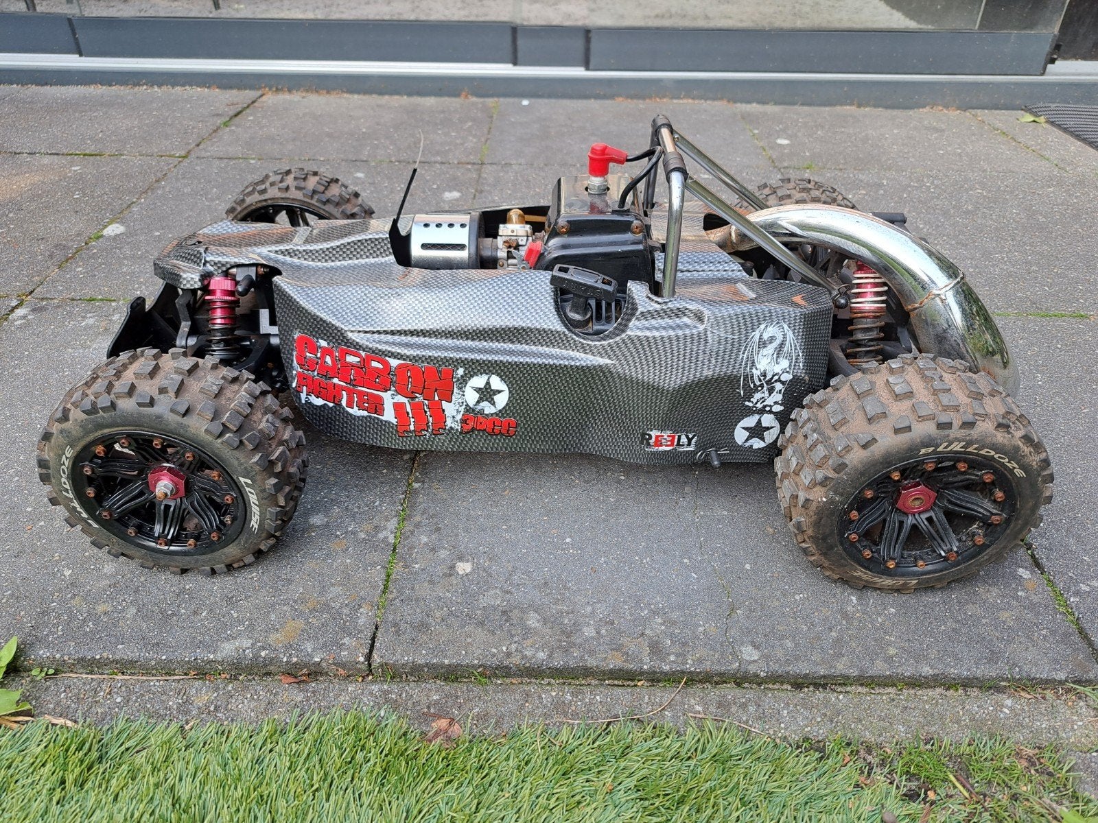 4 WD Reely Carbon Fighter, Benzine, Gebruikt, Auto offroad, Ophalen of Verzenden