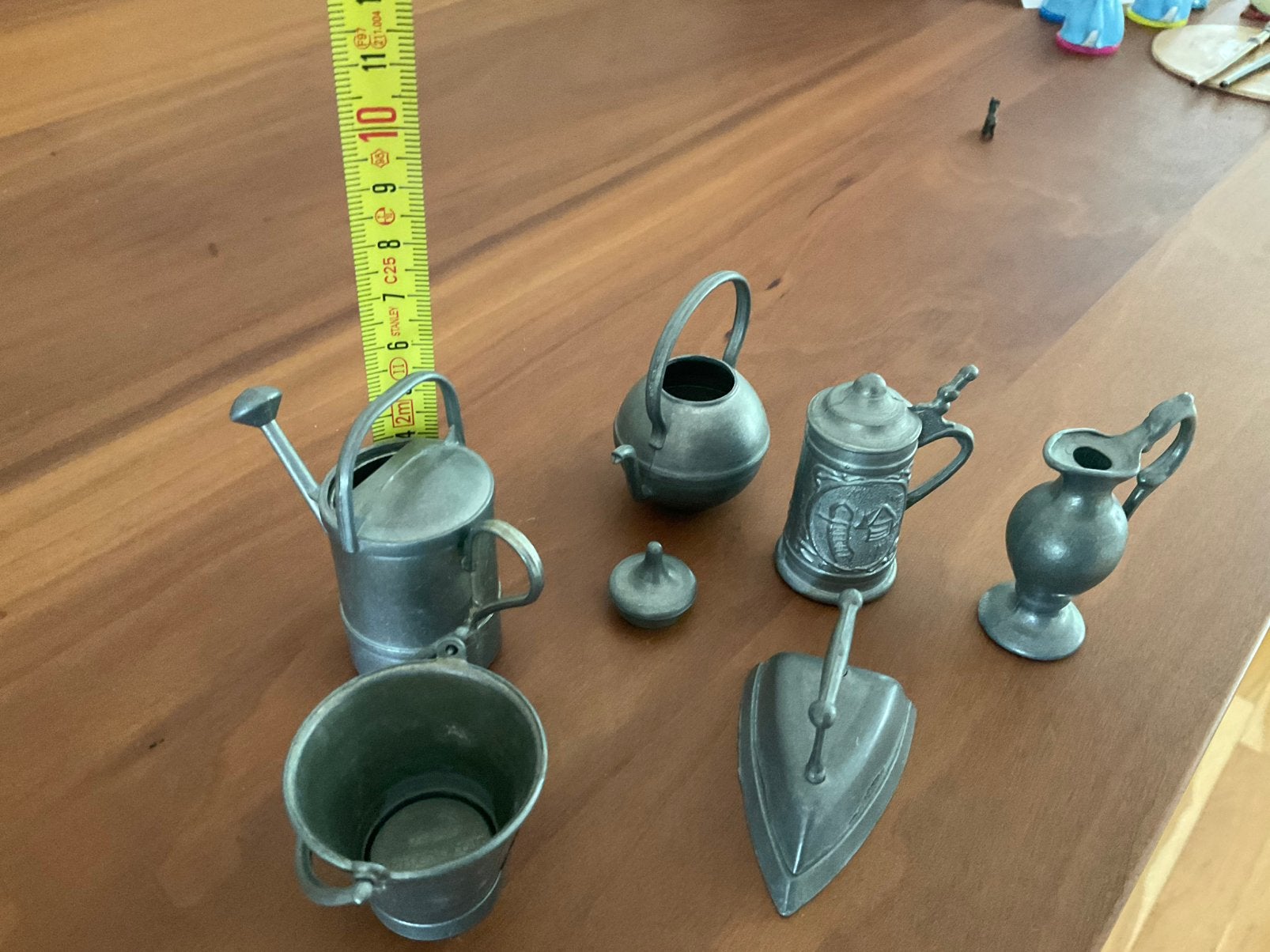 Tinnen miniaturen, Ophalen