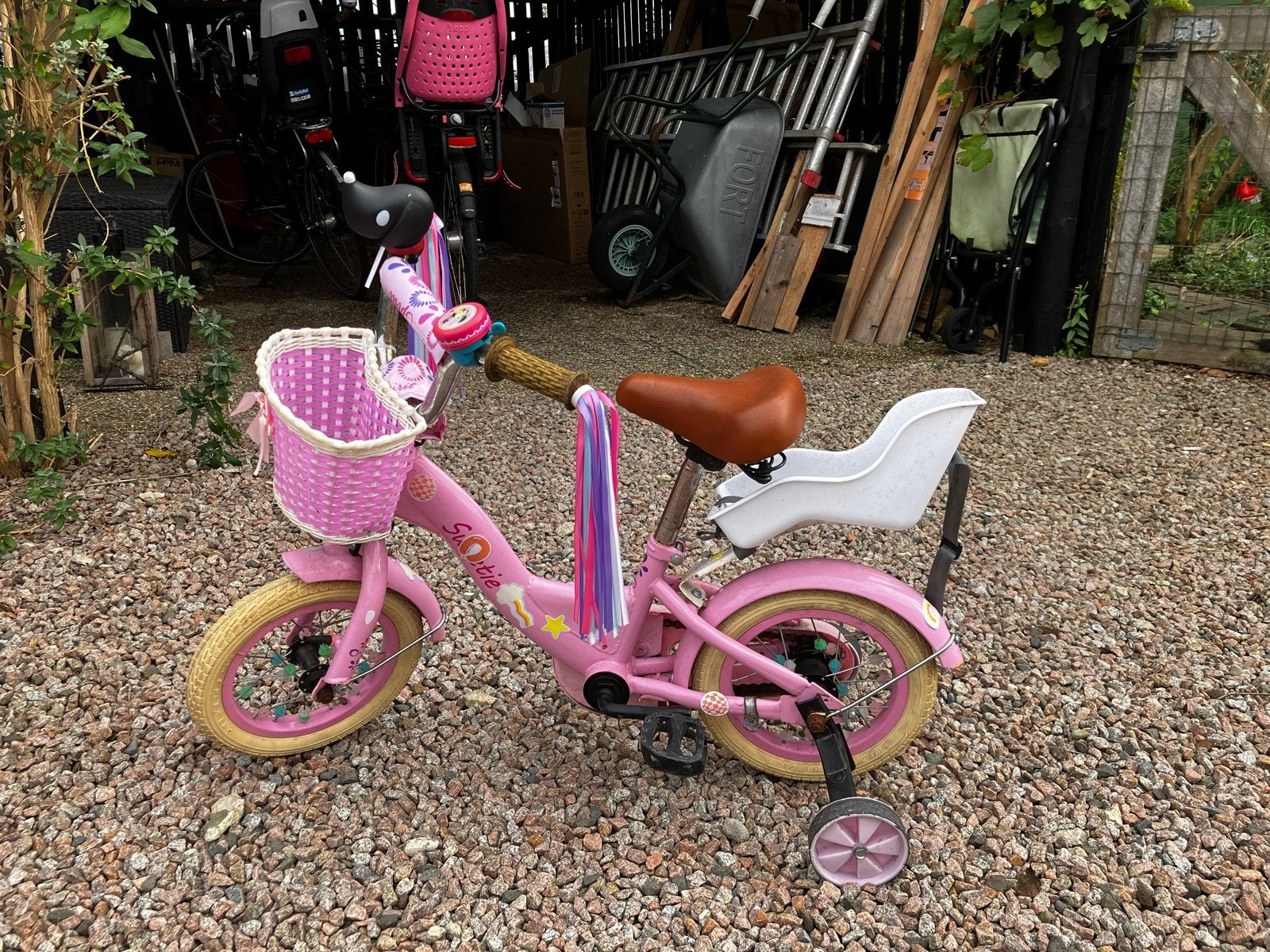 Roze kinderfiets 12 inch met zijwieltjes en zitje, Fietsen en Brommers, Ophalen, Terugtraprem, Zijwieltjes, Gebruikt
