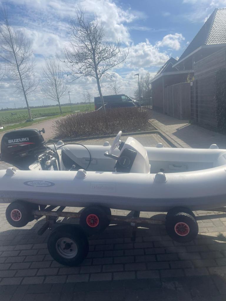 Zodiac rubberboot met Suzuki 9.9 motor en trailer, Watersport en Boten, Inclusief motor, Ophalen of Verzenden, Zo goed als nieuw