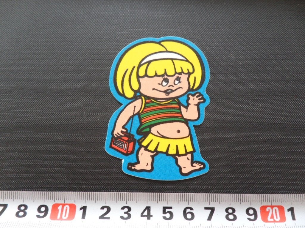 sticker textiel strip meisje transistor radio, Verzamelen, Ophalen, Zo goed als nieuw
