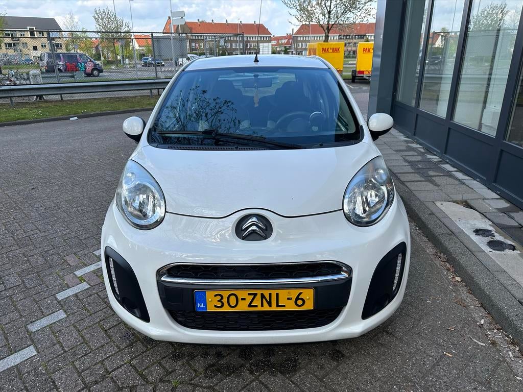 Citroën C1 1.0i 68PK 5D 2012 Wit, Auto's, Voorwielaandrijving, Stof, Zwart, 4 stoelen