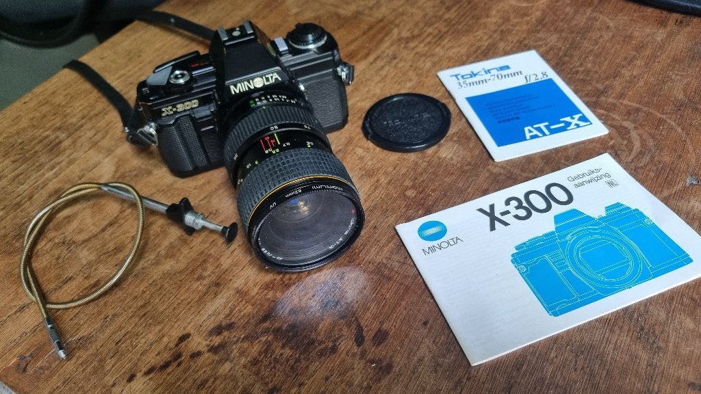 Minolta X-300 met 35-70 en 75-200 zoomlenzen, Ophalen of Verzenden, Gebruikt, Spiegelreflex, Minolta