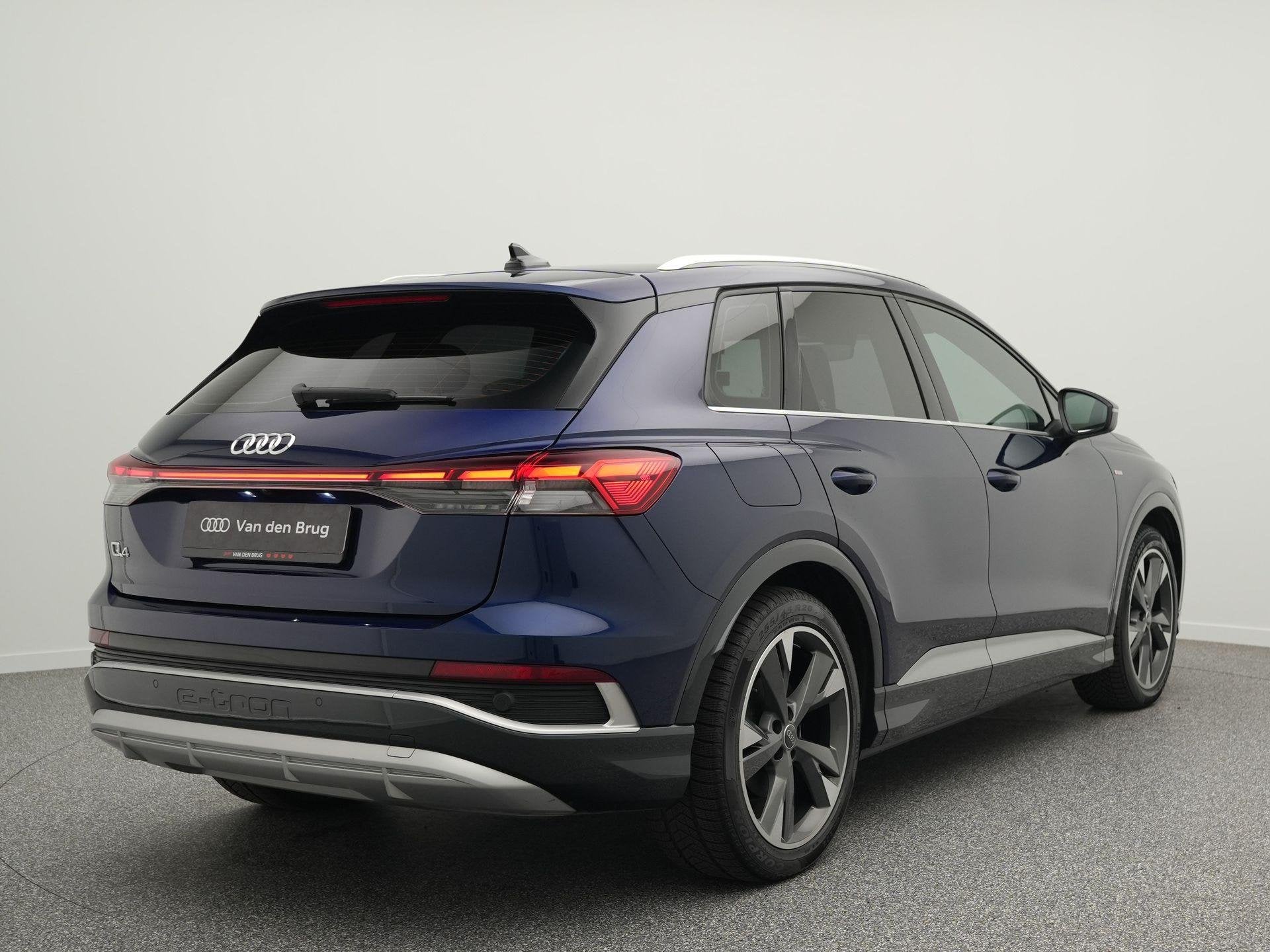 Audi Q4 e-tron S-line | 95,5% | Matrix LED | Stoelverwarming, Auto's, Automaat, Gebruikt, Zwart, 82 kWh