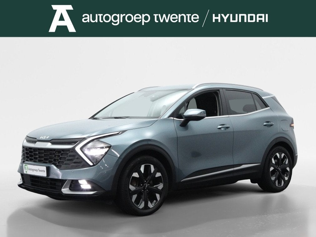 Kia Sportage 1.6 T-GDi PHEV Prestige AWD | Trekhaak | Naviga, Auto's, 4 cilinders, Blauw, Bedrijf, Grijs