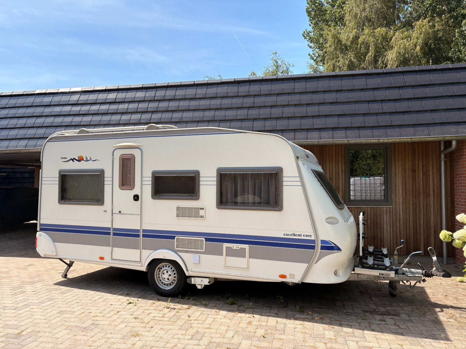 Hobby Excellent Easy caravan met voortent en fietsenrek, Vast bed, Rondzit, Hobby, Particulier