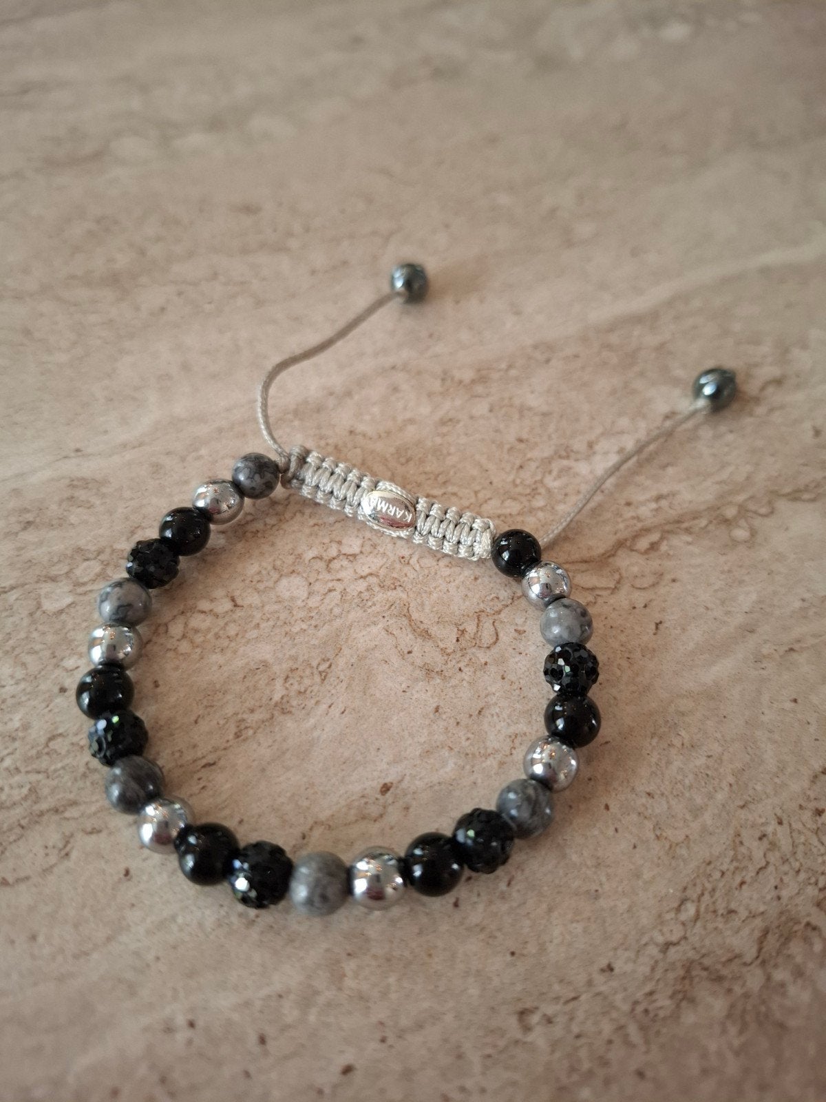 Karma armband, Sieraden, Tassen en Uiterlijk, Overige materialen, Gebruikt, Verzenden, Zwart