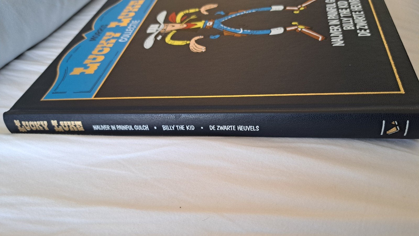 Lucky Luke Collectie nr 17 - Naijver in painful gulch, Eén stripboek, Ophalen of Verzenden, Zo goed als nieuw, Morris