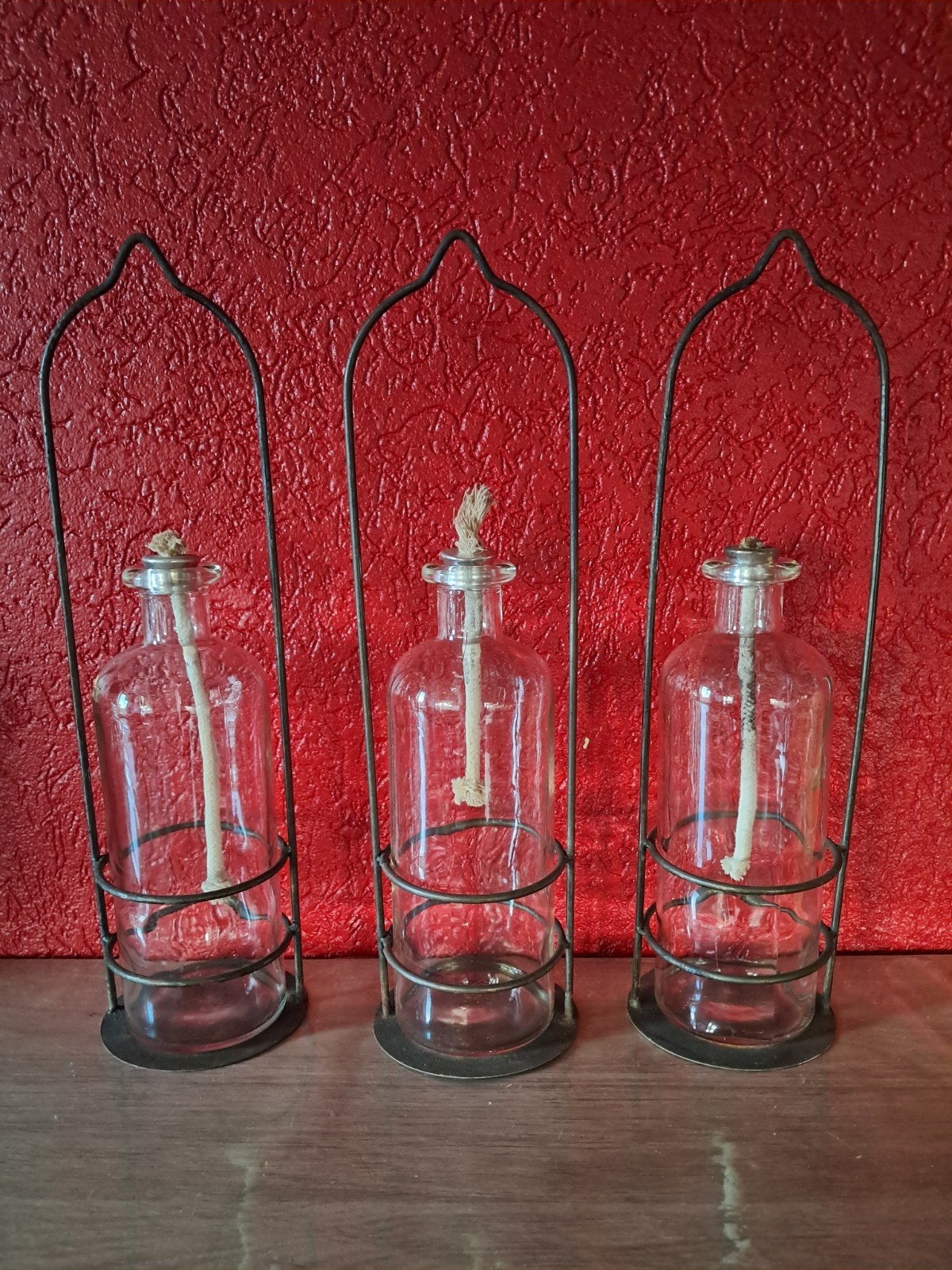 Glazen olielampen in een metalen frame., Ophalen of Verzenden