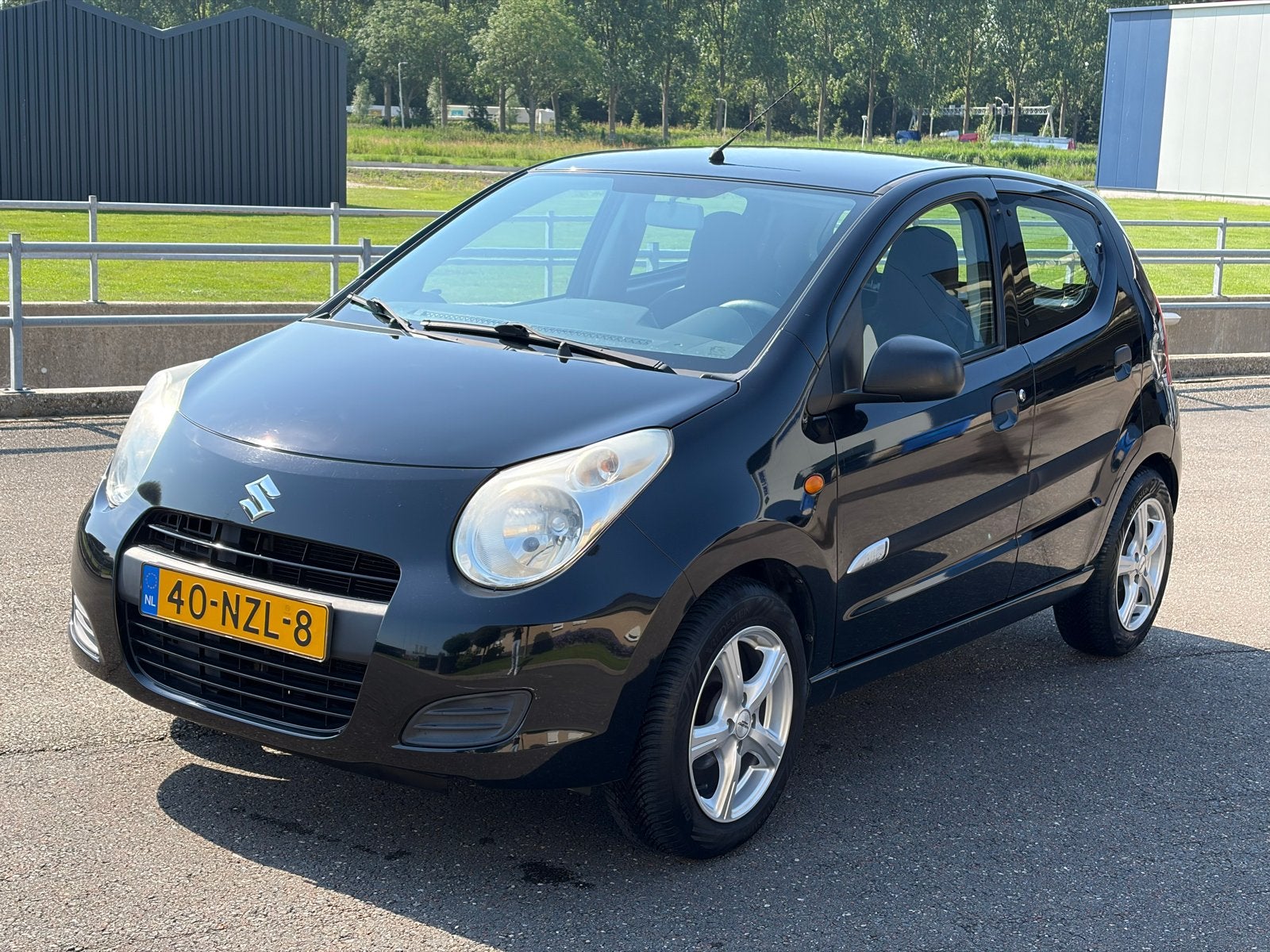 Suzuki Alto 1.0 2011 Zwart, Voorwielaandrijving, Euro 5, Stof, 4 stoelen