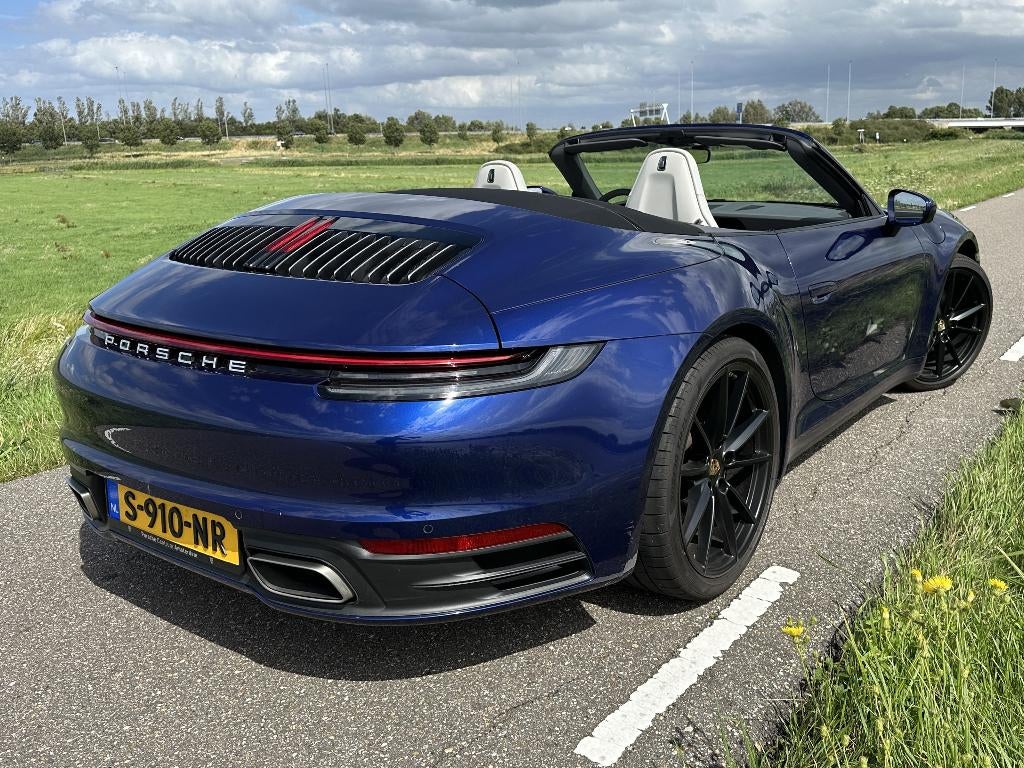 Porsche 911(992) Carrera 4 Cabrio Sportuitlaat Dealeronderh., Auto's, Automaat, USB, Cabriolet, 2981 cc