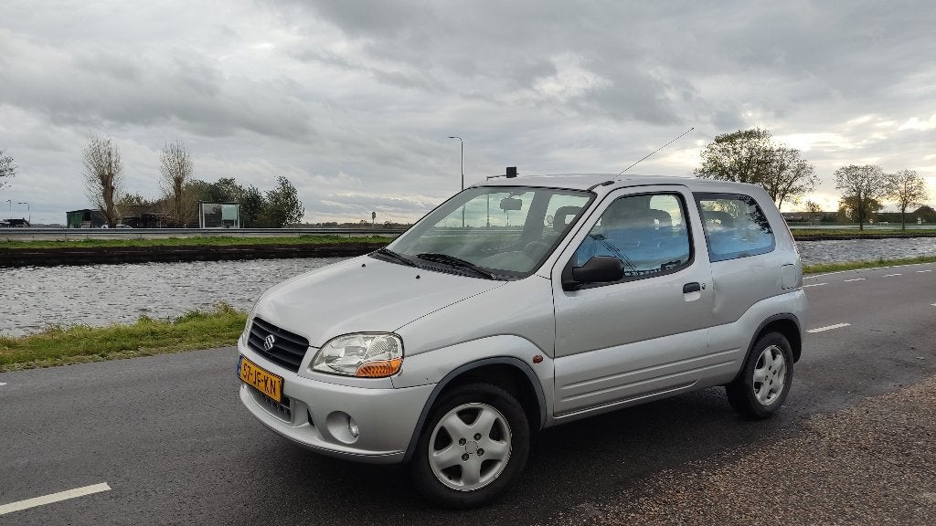 Suzuki Ignis 1.3 GL 2002 Grijs, Auto's, Voorwielaandrijving, 83 pk, Stof, 31 €/maand