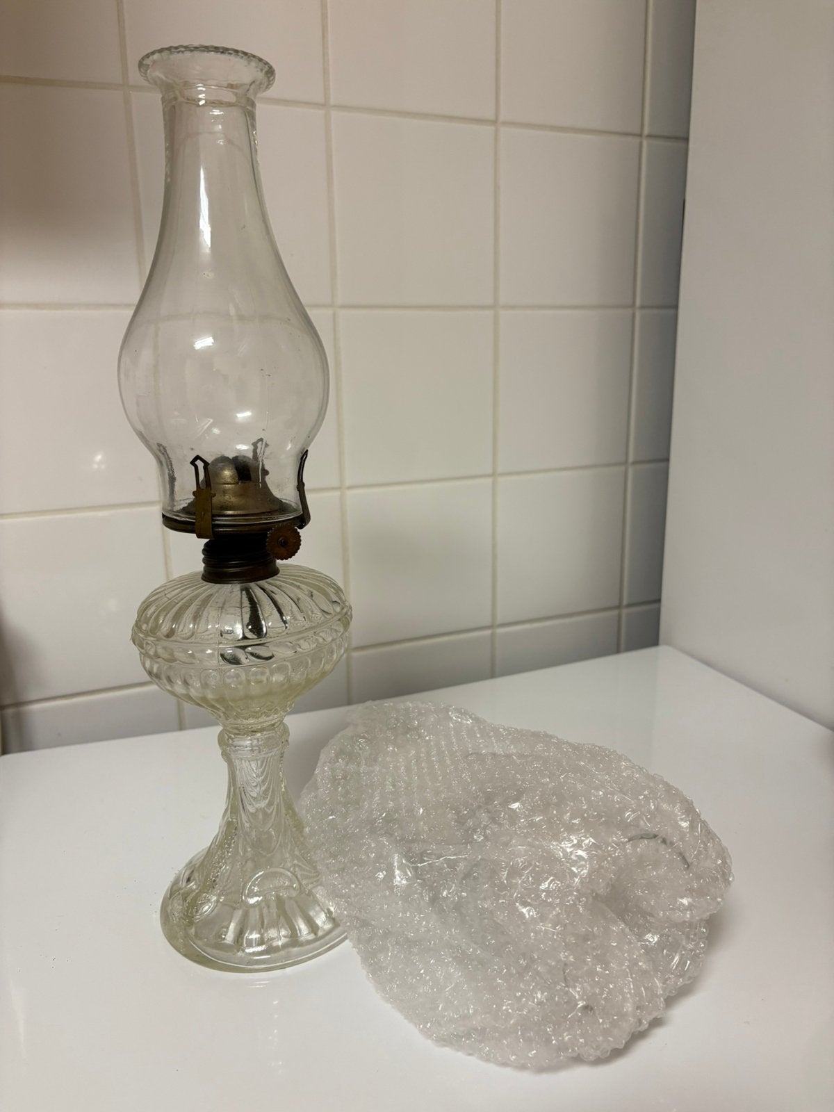 Antieke Franse petroleumlamp, Ophalen