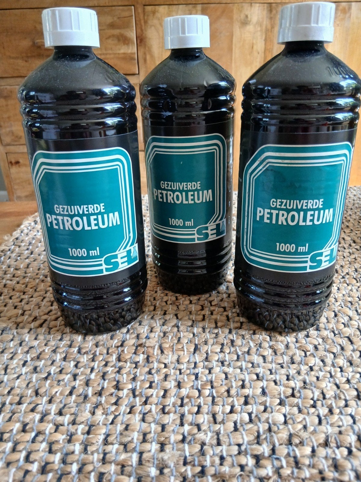 3 flessen gezuiverde petroleum voor petroleumstel, Ophalen