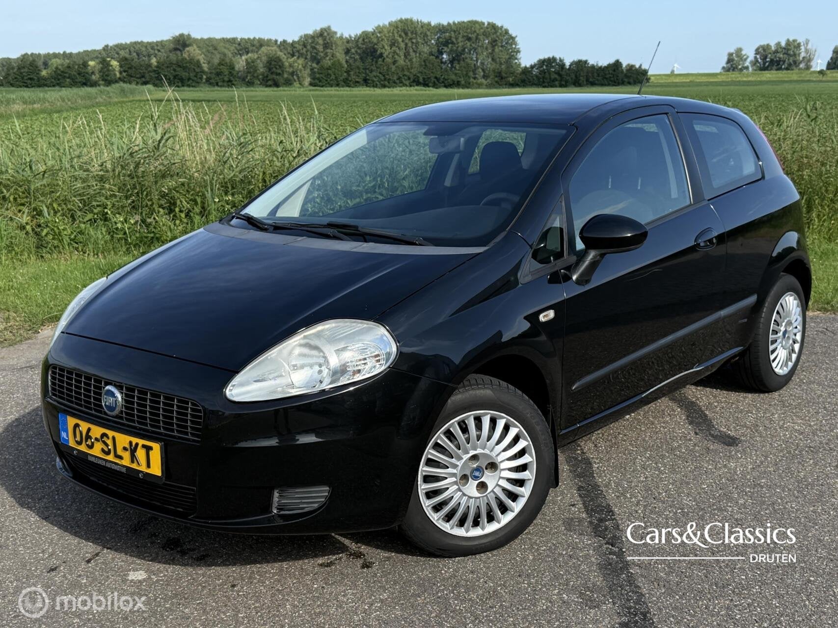 Fiat Grande Punto 1.2, AIRCO, 3 DEURS, Stof, 4 cilinders, Zwart, Origineel Nederlands