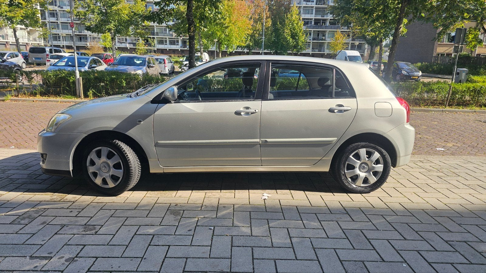 Foto 3 van Toyota Corolla 1.6 16V Vvt-i 5DR Linea Terra 2006 Grijs