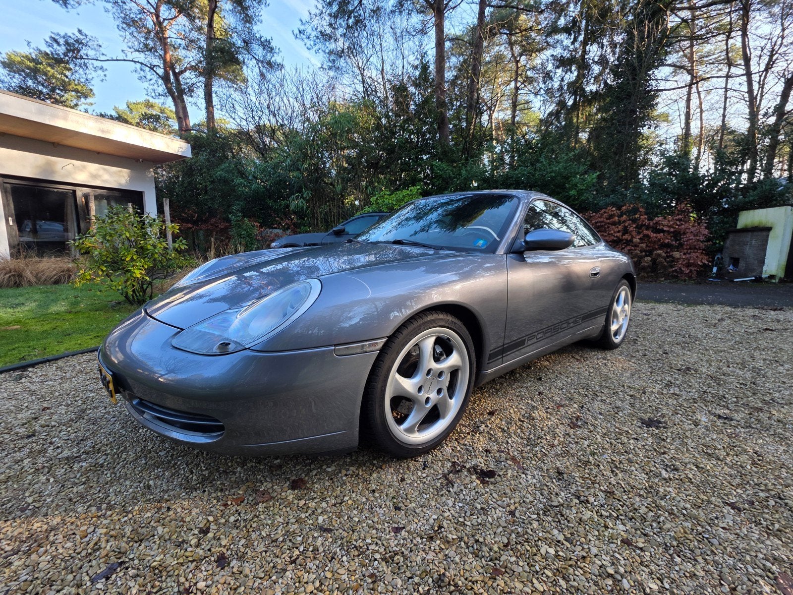 Porsche 911 3.4 996/2 Carrera 4 tiptronic AUT 2001 Grijs, Auto's, Automaat, Zwart, 4 stoelen, Leder