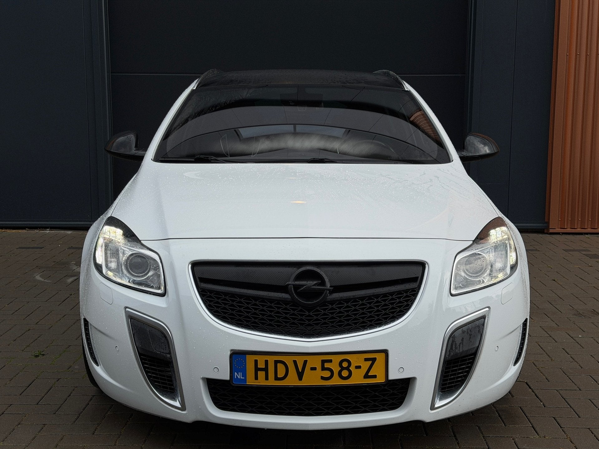 Opel Insignia Sports Tourer 2.8 T OPC 4x4|Smetteloze Staat!|, Auto's, Opel, Euro 5, Gebruikt, Zwart, Wit