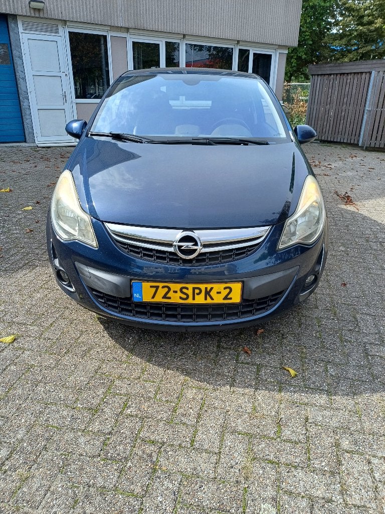 Opel Corsa 1.2 16V LPG 3D 2011 Blauw, Auto's, Voorwielaandrijving, 83 pk, 4 cilinders, Blauw