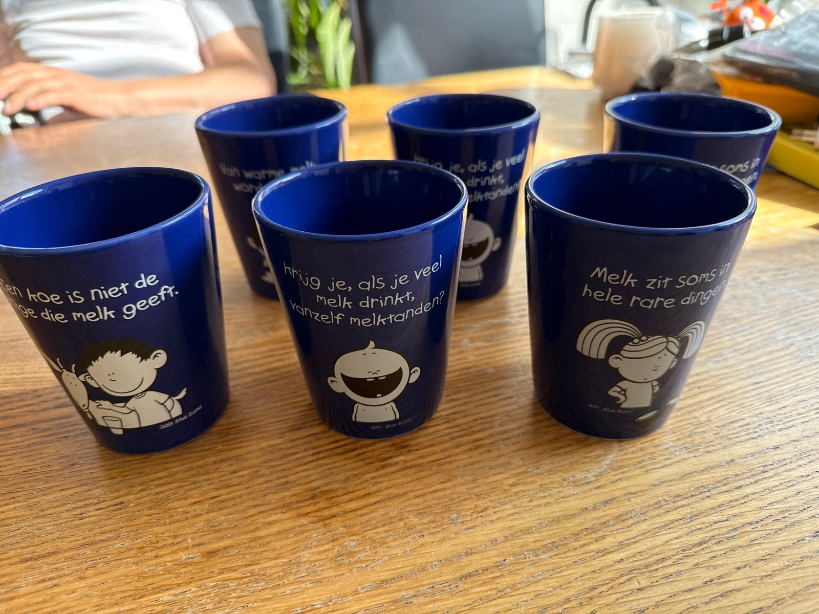 Set van 6 Blue Band melkbekers met leuke teksten, Ophalen of Verzenden, Zo goed als nieuw, Gebruiksvoorwerp