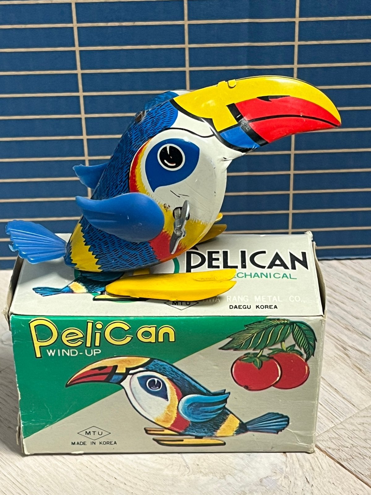Vintage blikken speelgoed MTU Pelican Wind-Up Toy – Korea, Antiek en Kunst, Verzenden
