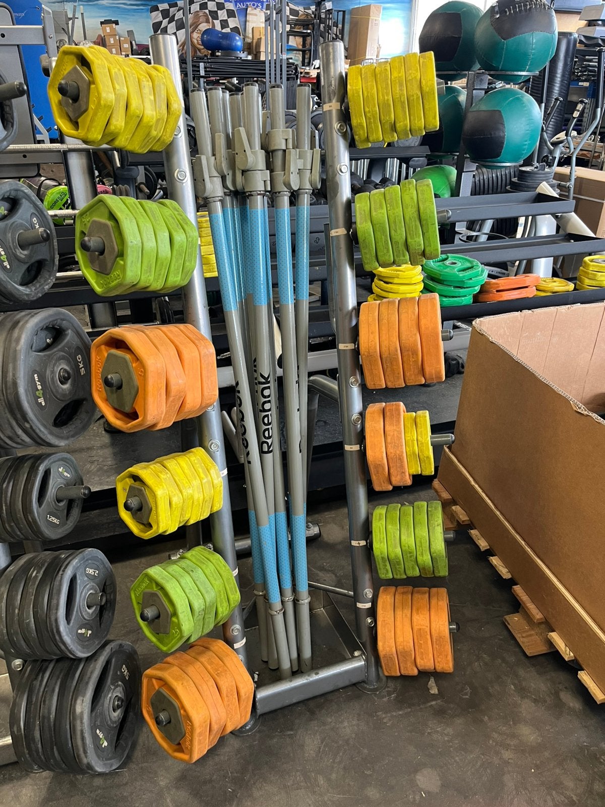 10 x reebok rep bodypump sets met rek, Ophalen, Gebruikt, Reebok, Met rek
