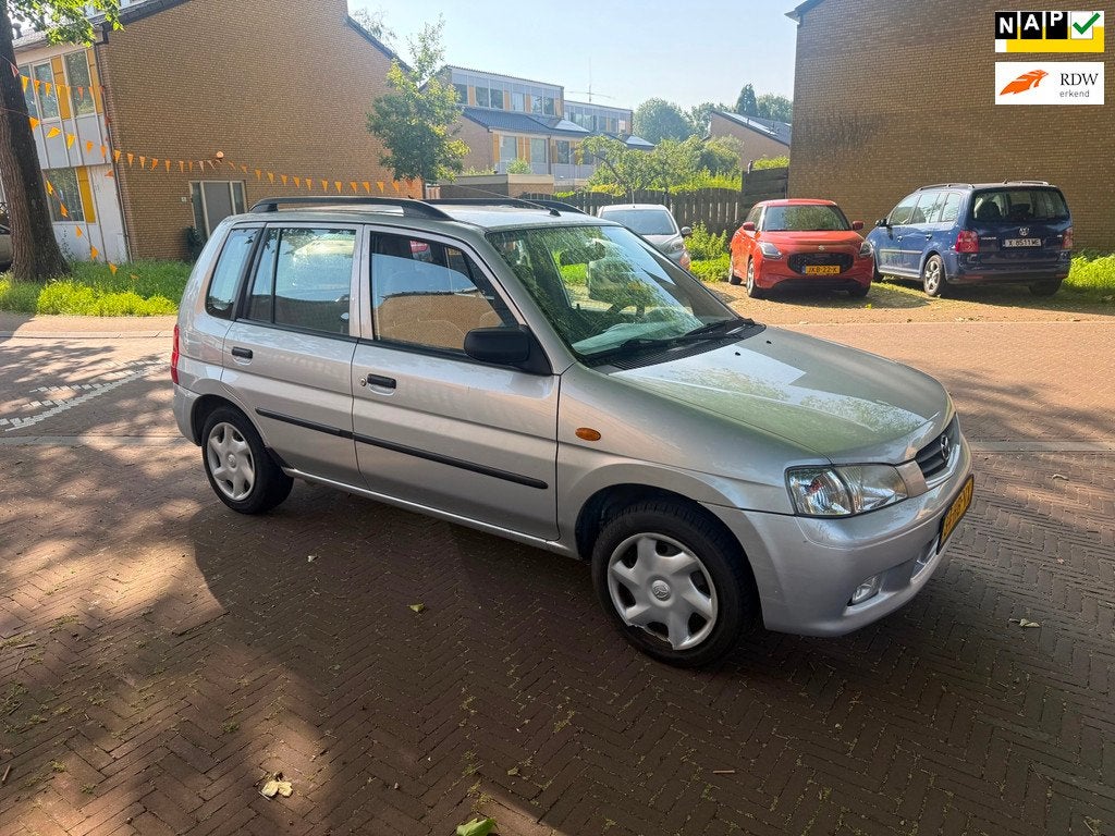 Mazda Demio AUTOMAAT / Nieuw APK / 4X elektrische ramen, Auto's, Mazda, Bedrijf, 75 pk, Zilver of Grijs, 900 kg