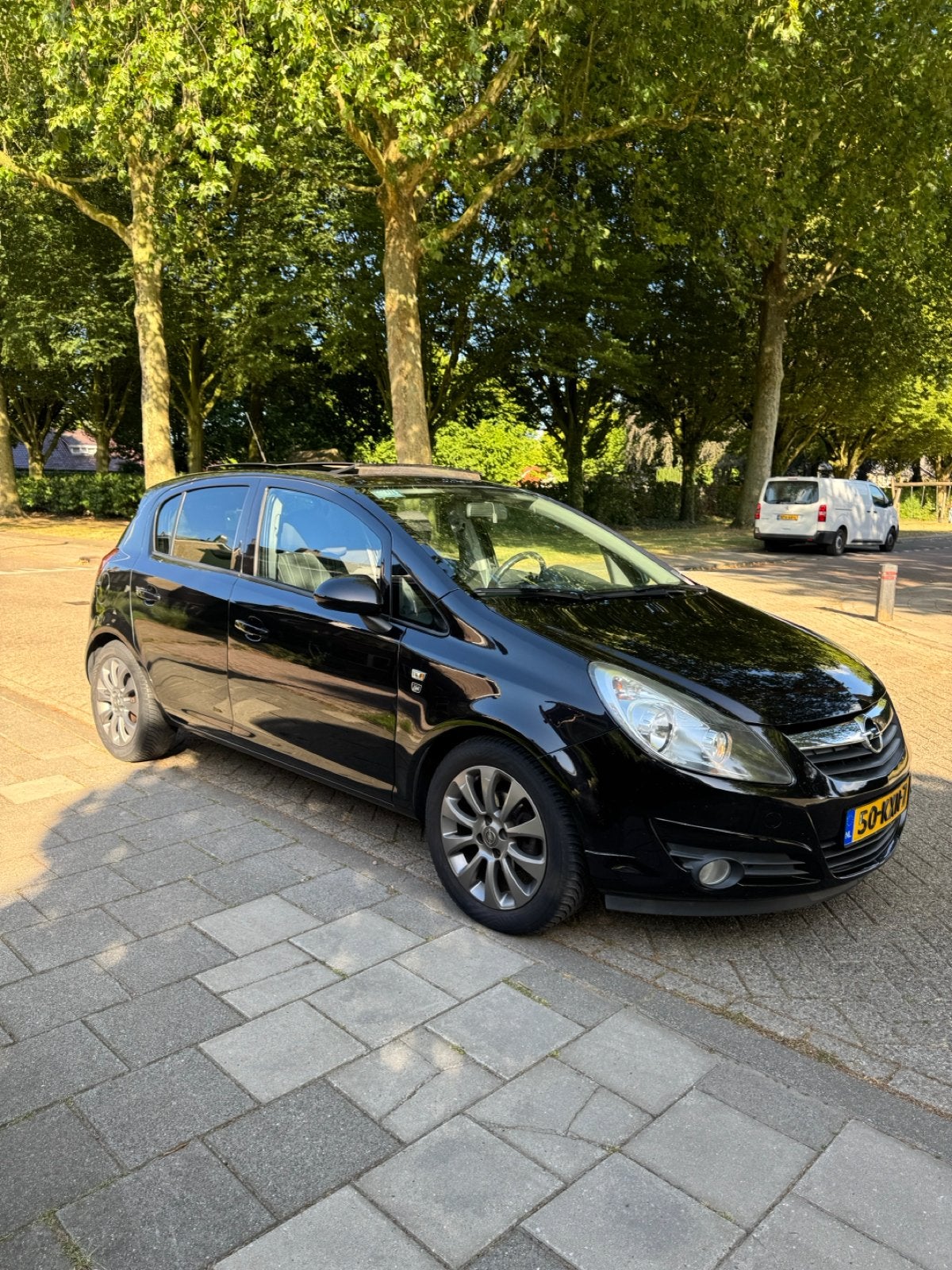 Opel Corsa 1.2 16V 5D 2010 Zwart, Auto's, Opel, Voorwielaandrijving, 4 cilinders, 1229 cc, Origineel Nederlands