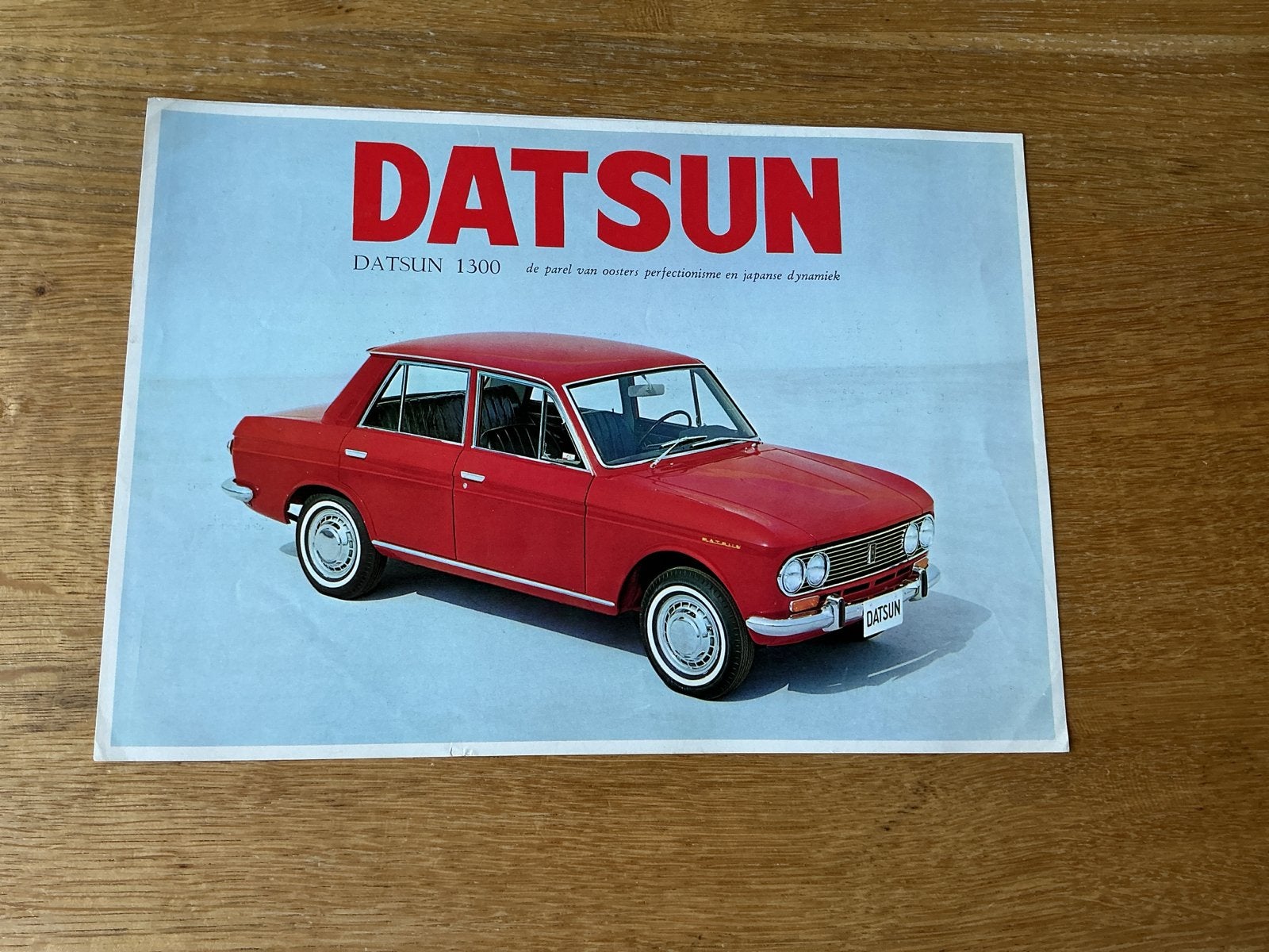 Datsun 1300 brochure uit 1966, Ophalen of Verzenden, Gelezen, Overige merken