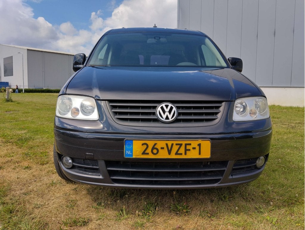 VW Caddy 2009 diesel automaat, airco, cruise trekhaak g.st., Stof, Zwart, Origineel Nederlands, Grijs