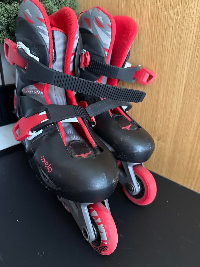 Oxelo inline skates rood/zwart, Overige merken, Ophalen of Verzenden, Inline skates 4 wielen, Verstelbaar