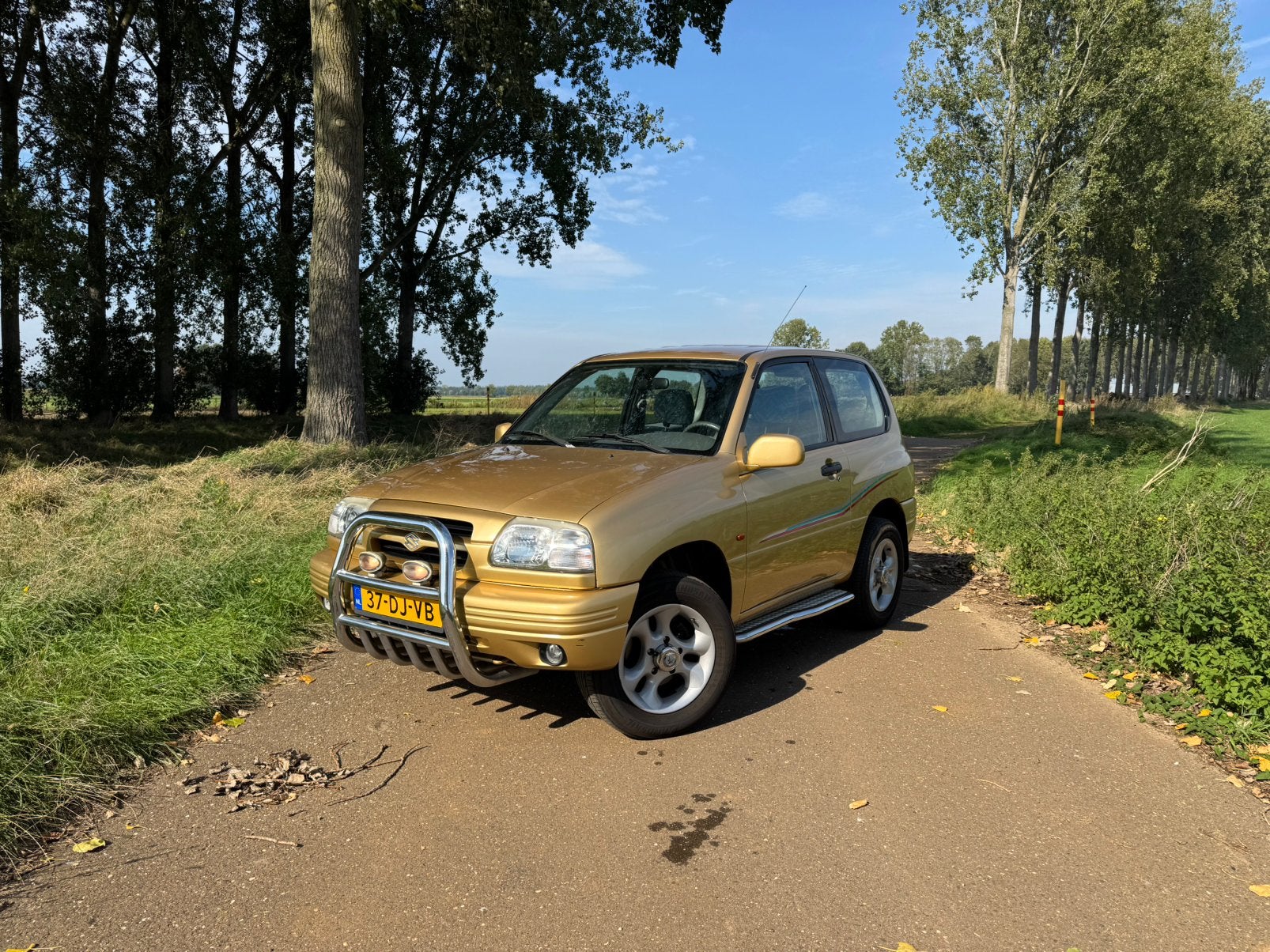 Suzuki Grand Vitara 2.0 4x4 3D 1999 Geel 71.000 KM!, Auto's, Stof, 1995 cc, 4 cilinders, Handgeschakeld