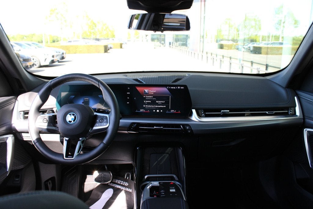 BMW X1 xDrive25e M Sport Automaat / Sportstoelen / Comfort A, Auto's, BMW, 136 pk, Gebruikt, Zwart, Met garantie (alle)