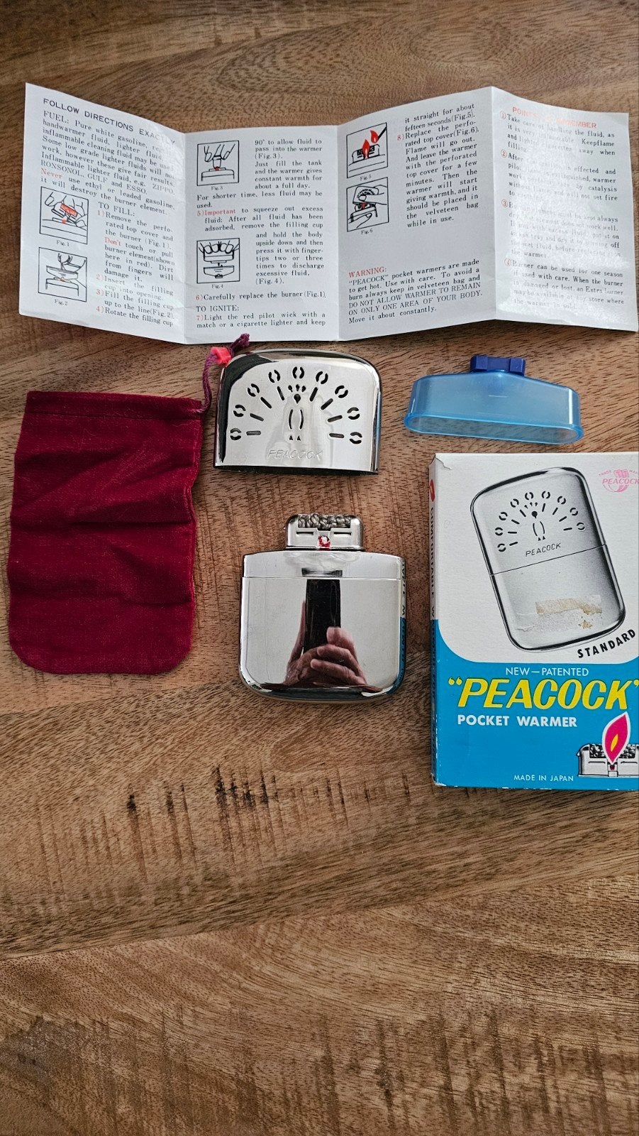Peacock Pocket Warmer - Nieuw in doos, Verzamelen, Rookartikelen, Aanstekers en Luciferdoosjes, Ophalen of Verzenden, Nieuw, Overige typen