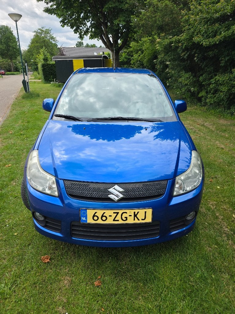 Suzuki SX4 1.6 AUT 2008 Blauw, Auto's, Suzuki, Stof, 4 cilinders, Metallic lak, 49 €/maand