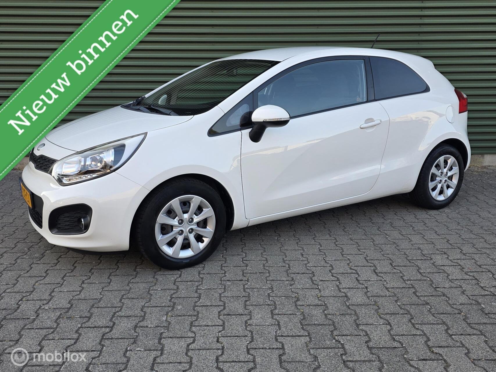 Kia Rio 1.2 CVVT Plus Pack|Airco|CruiseControle|2x Sleutel|, Euro 5, Zwart, 4 cilinders, Wit