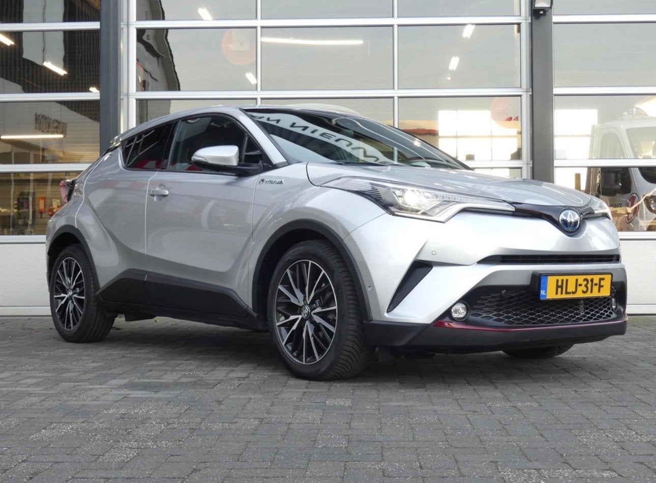 Toyota C-HR 1.8 Hybrid 122pk CVT 2018 Zilver, Auto's, 725 kg, 4 cilinders, Leder en Stof, 98 pk