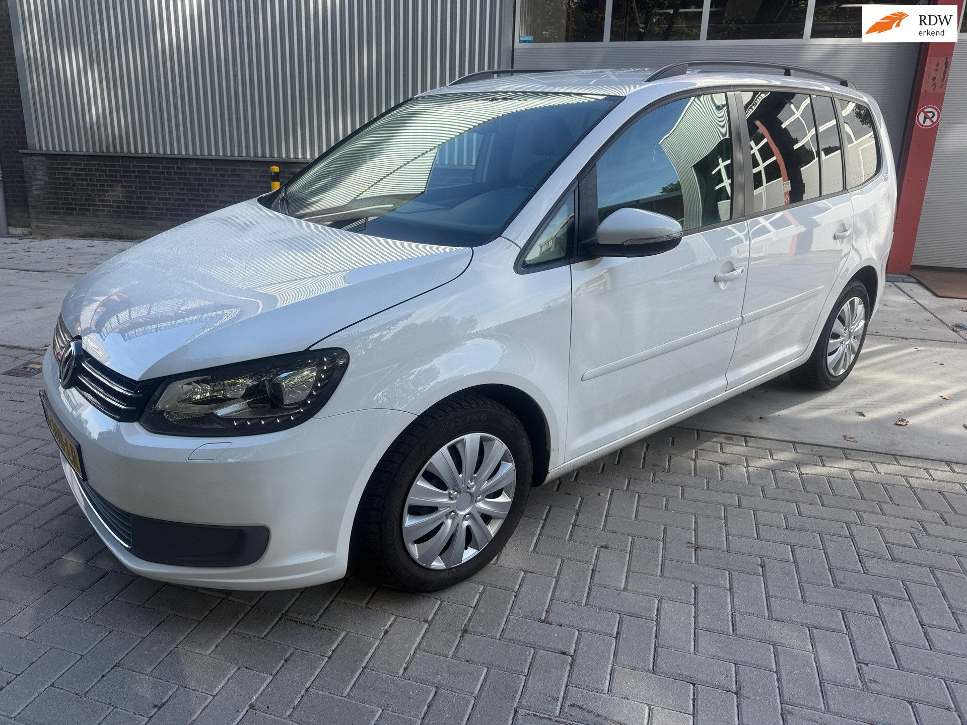 Volkswagen Touran 1.2 TSI Trendline Bluemotion 7p. NAVI AIRC, Voorwielaandrijving, Euro 5, Gebruikt, 4 cilinders