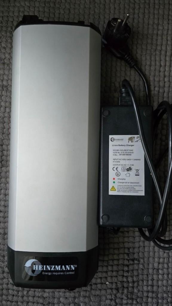 Heinzmann / BMZ e-bike accu 36v met oplader, Ophalen of Verzenden, Zo goed als nieuw
