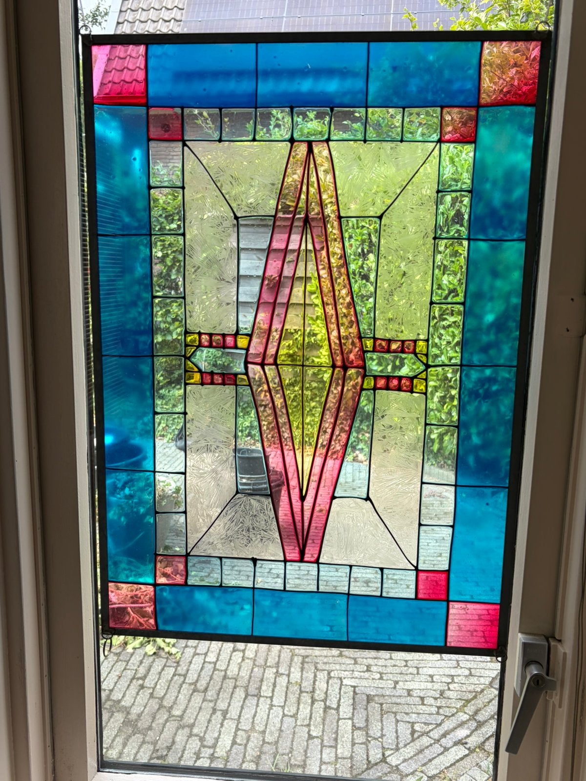 Glazen paneel in Tiffany-stijl, Ophalen
