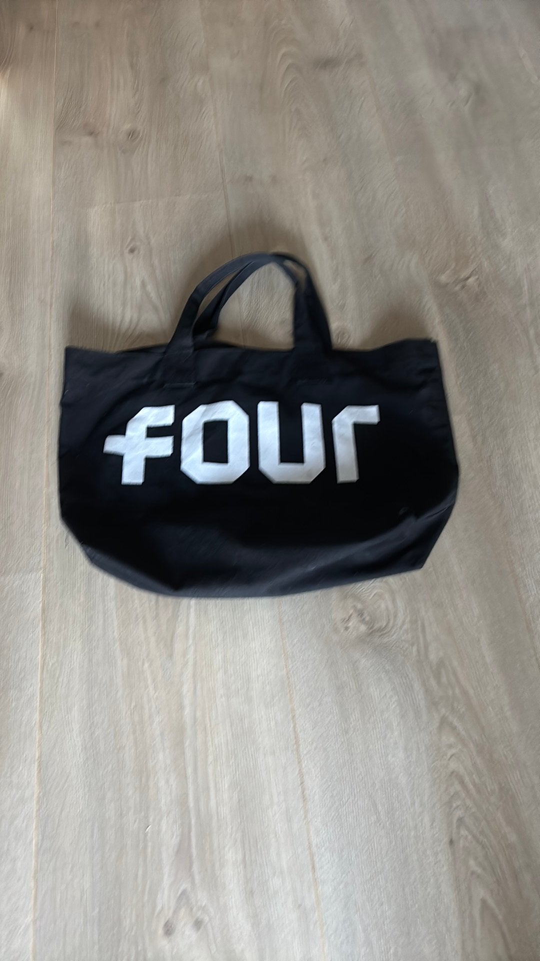 Four tas, Ophalen, Zo goed als nieuw