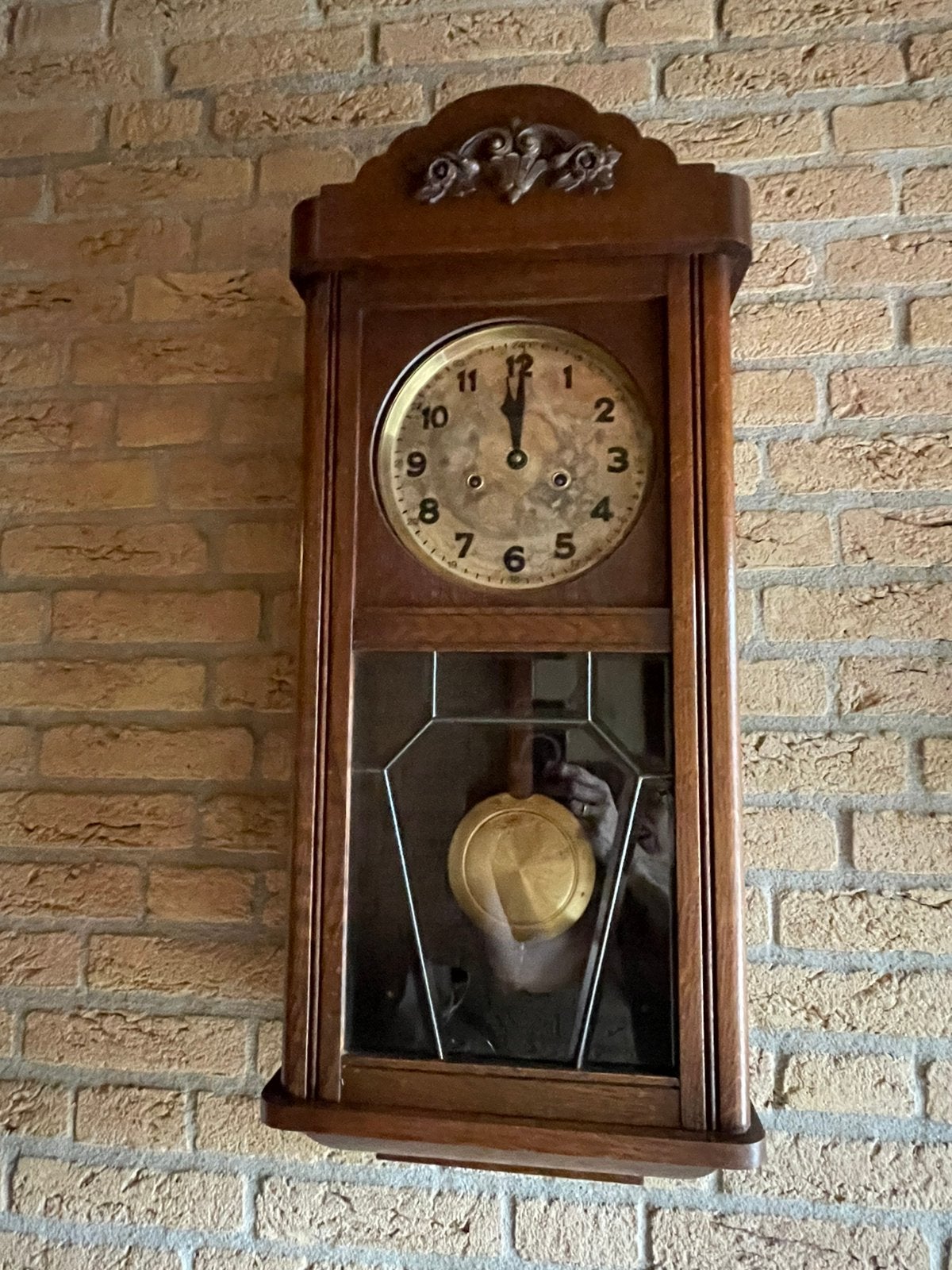 Wandklok met slinger, Ophalen
