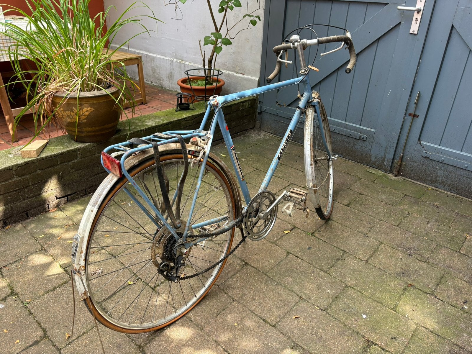Vintage oude racefiets (opknapper), Ophalen