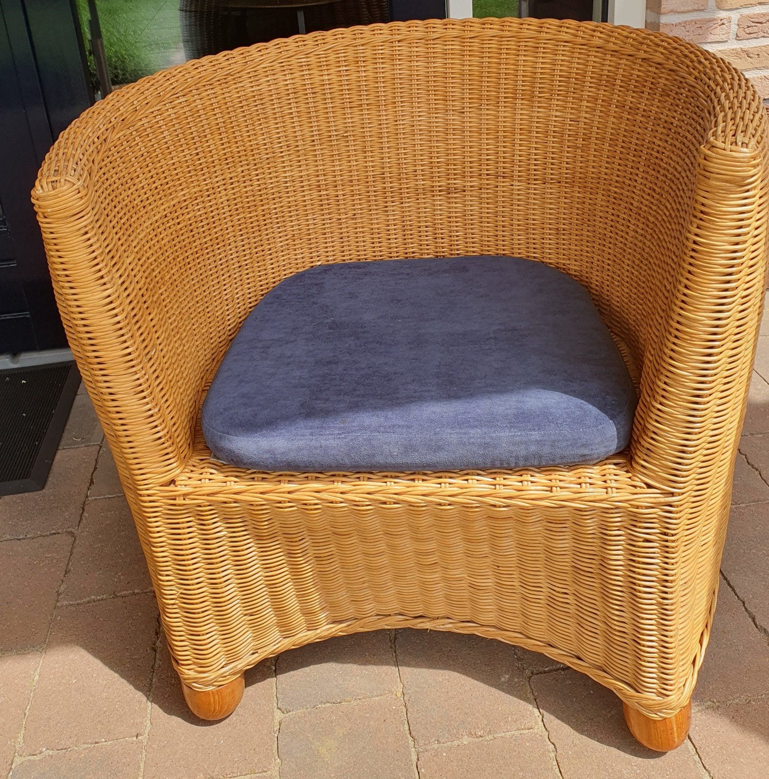 Rieten stoel met kussen., Huis en Inrichting, Fauteuils, Ophalen, 50 tot 75 cm
