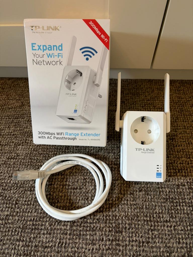 TP Link 300 Mbps Wifi Range Extender met Stopcontact, Ophalen of Verzenden, Gebruikt